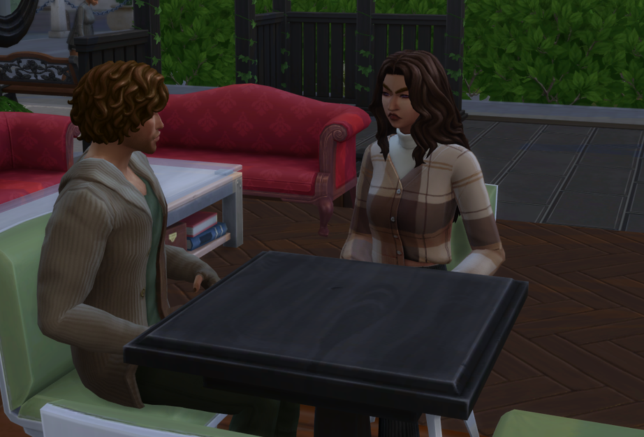A Sims 4 screenshot, Elmira glaring daggers at Sawyer as they sit next to each other in a cafe.