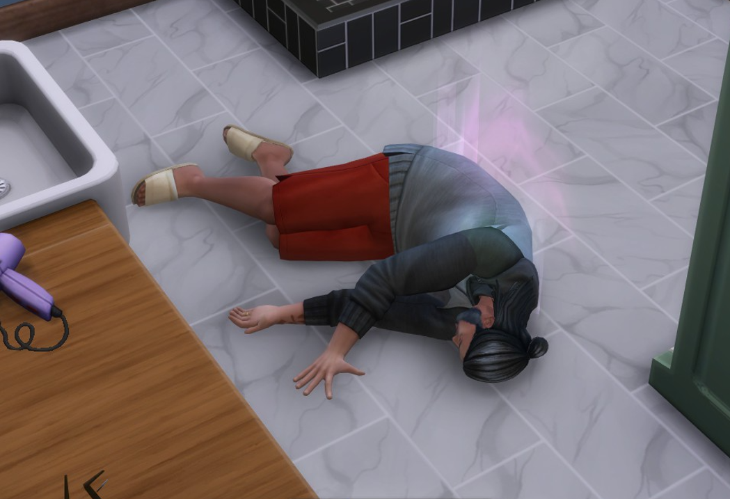 A Sims 4 screenshot, Salim dead on the bathroom floor.